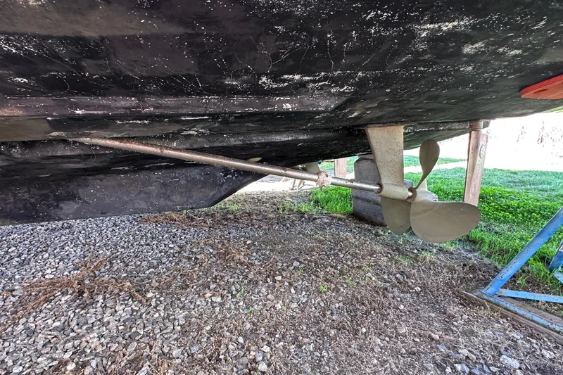 Slide: The Image of Underwater view of 1988 Silverton 37 Convertible boat propeller and shaft. - 52