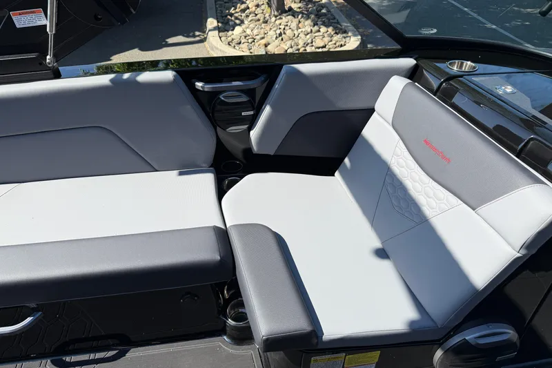 Slide: The Image of Interior seating of 2026 MasterCraft NXT24 boat, featuring modern design and comfortable upholstery. - 22