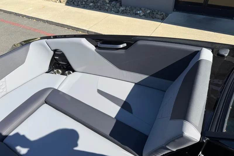 Slide: The Image of 2026 MasterCraft NXT24 boat interior with sleek, modern seating design. - 27