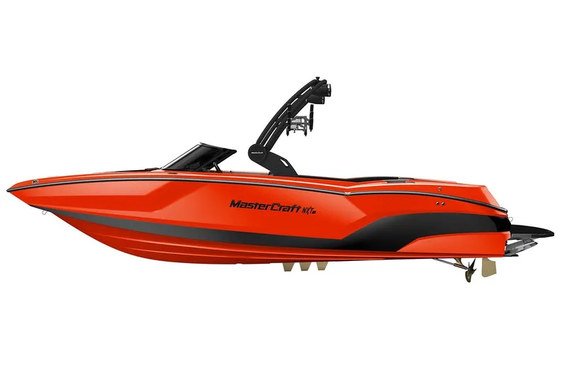 Slide: The Image of 2026 MasterCraft NXT24 boat on trailer outside dealership. - 3