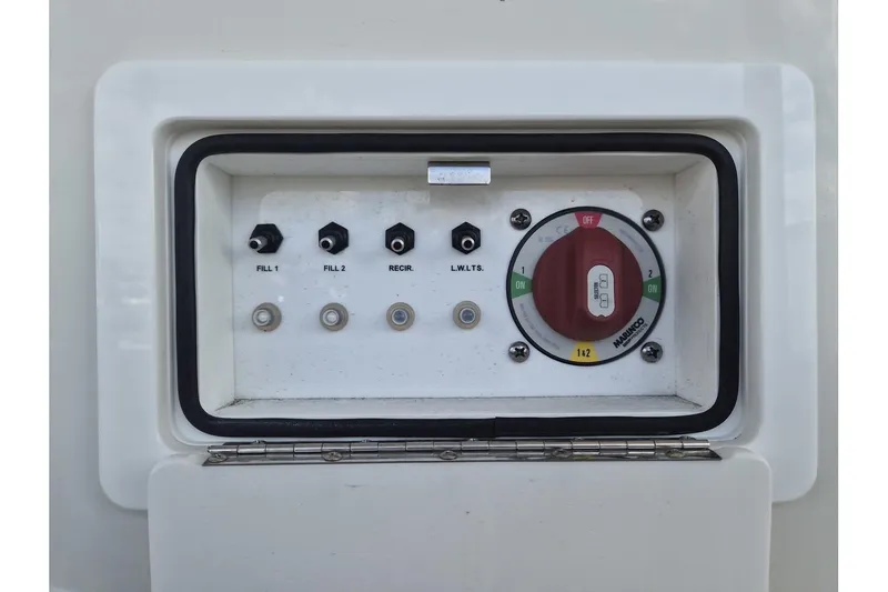 Slide: The Image of Control panel of 2026 Ranger 2600 Bay boat with switches and dial. - 12