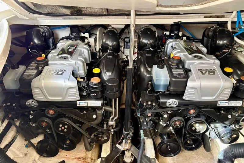 Slide: The Image of Twin V8 engines in a 2018 Sea Ray Sundancer 350 Coupe boat. - 17