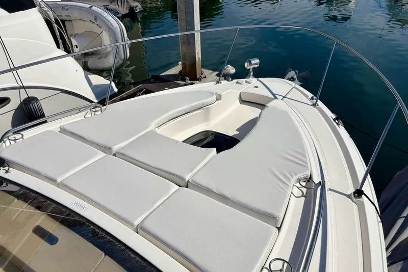 Slide: The Image of 2018 Sea Ray Sundancer 350 Coupe with spacious sunbathing area on deck. - 18