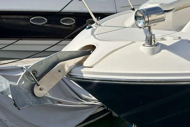 Slide: The Image of 2018 Sea Ray Sundancer 350 Coupe bow with anchor and spotlight. - 19