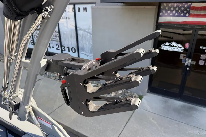 Slide: The Image of 2026 MasterCraft NXT22 boat with advanced wakeboard rack system. - 28
