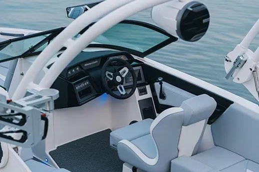 Slide: The Image of Manufacturer Provided Image: 2026 MasterCraft NXT22 boat interior with modern dashboard and seating. - 4