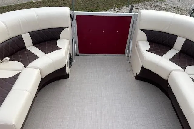 Slide: The Image of Luxurious seating on 2022 Lexington HP320 boat with elegant upholstery design. - 10