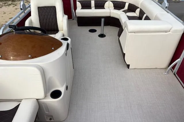 Slide: The Image of Luxurious 2022 Lexington HP320 boat interior with plush seating and modern helm. - 11