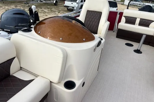 Slide: The Image of Luxurious Lexington HP320 boat interior with plush seating and modern dashboard, 2022 model. - 6