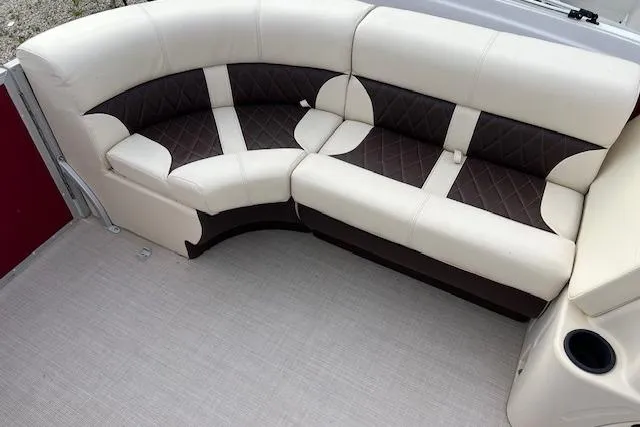 Slide: The Image of Luxurious Lexington HP320 boat seating, 2022 model, featuring cream and brown upholstery. - 9