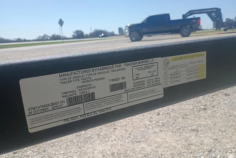 Slide: The Image of Label on Nitro Z21 Pro trailer, manufactured by Tracker Marine L.P., with specifications. - 11