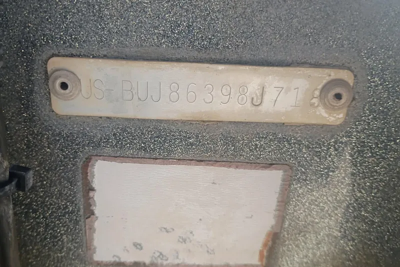 Slide: The Image of Serial number plate on Nitro Z21 Pro, year 2048, with textured background. - 13