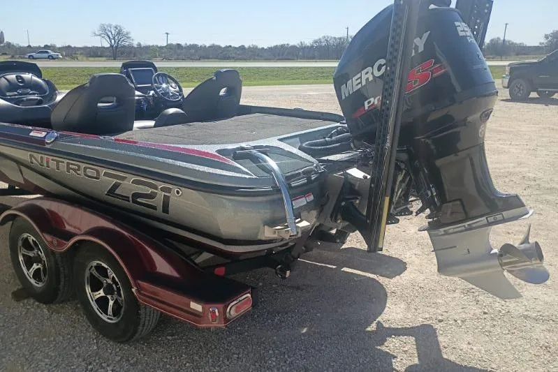 Slide: The Image of Nitro Z21 Pro 2048 boat with Mercury Pro XS engine on a trailer. - 4