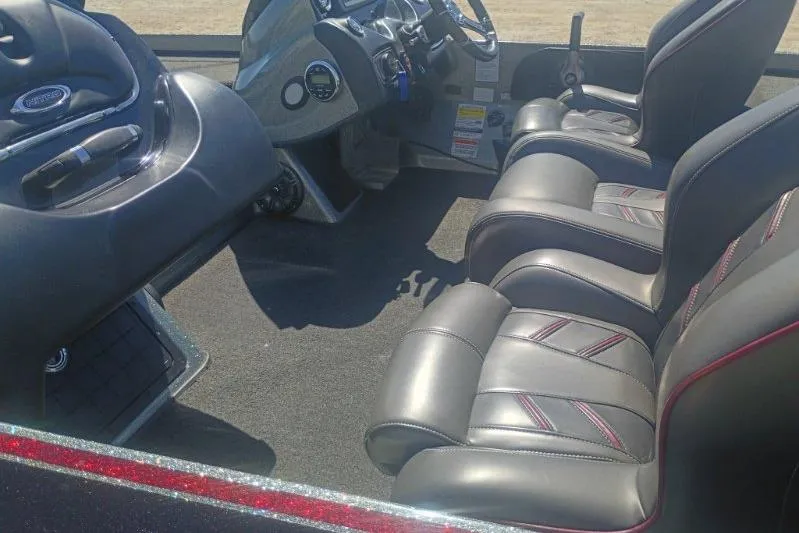 Slide: The Image of Interior of a 2048 Nitro Z21 Pro boat with sleek leather seating. - 8