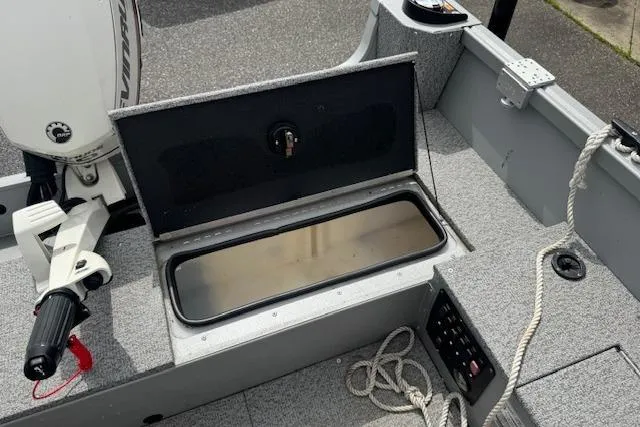 Slide: The Image of Alumacraft Summit 180 boat interior with open storage compartment, 2020 model. - 15