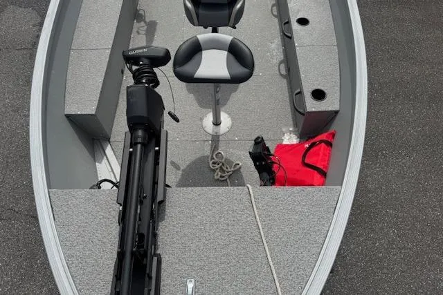Slide: The Image of 2020 Alumacraft Summit 180 boat interior with seating, motor, and equipment. - 9