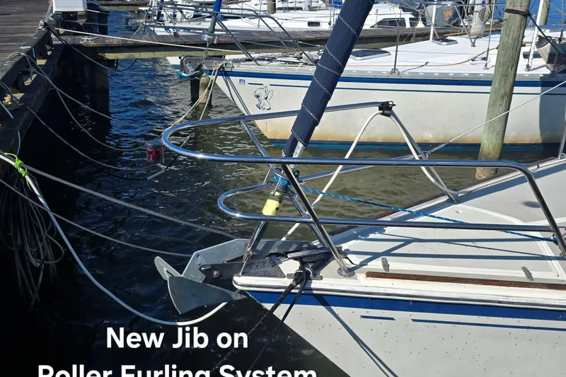 Slide: The Image of 1985 O'Day 31 sailboat with new jib on roller furling system at dock. - 3