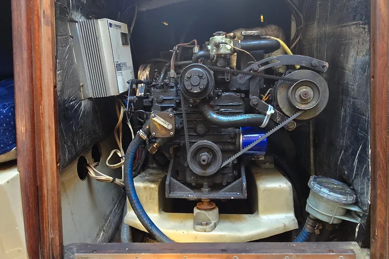 Slide: The Image of 1985 O'Day 31 sailboat engine compartment with visible mechanical components. - 31