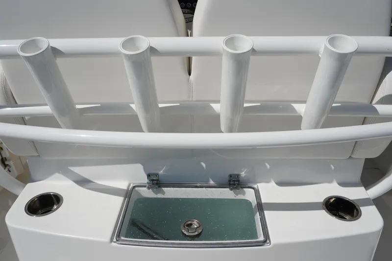 Slide: The Image of 2024 Regulator 26XO boat with rod holders and livewell. - 46