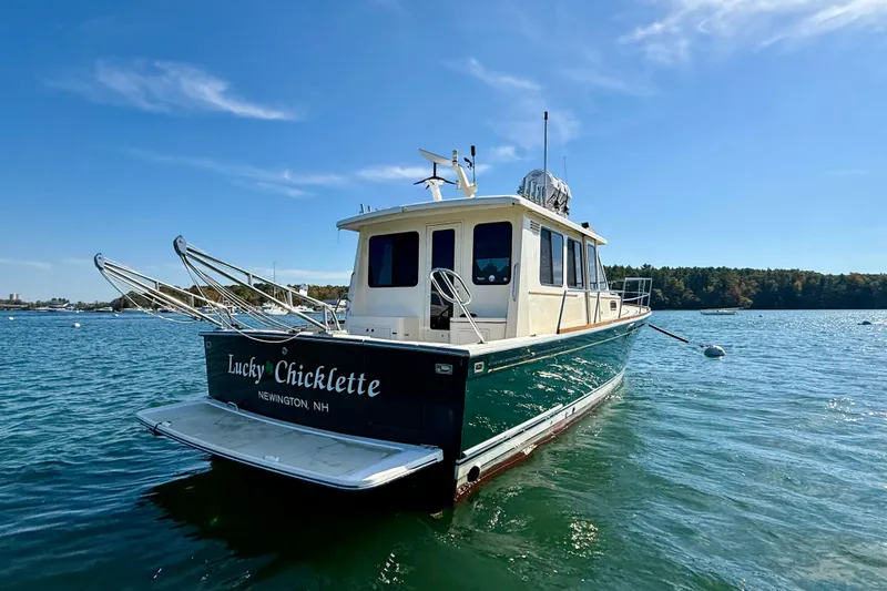 Slide: The Image of 2006 Sabre 42 Sedan boat "Lucky Chicklette" on water, Newington, NH. - 8