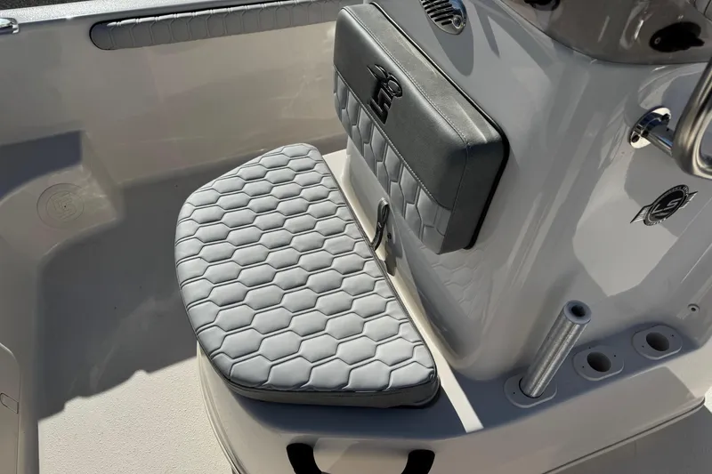 Slide: The Image of 2026 Carolina Skiff 19 LS boat seat with hexagonal pattern and console details. - 10