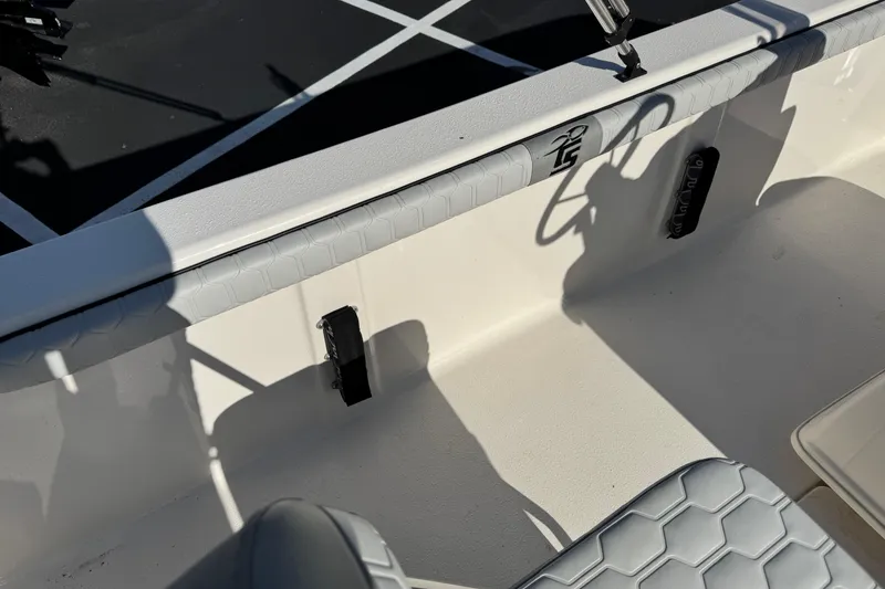 Slide: The Image of 2026 Carolina Skiff 19 LS boat interior with steering wheel and seating detail. - 11