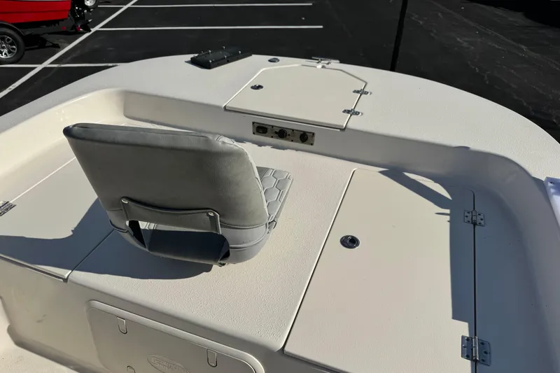 Slide: The Image of 2026 Carolina Skiff 19 LS boat deck with seating and storage compartments. - 7