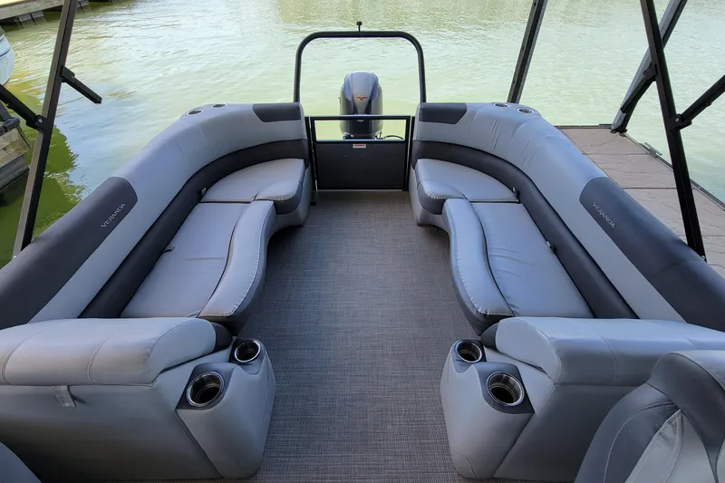 Slide: The Image of 2023 Veranda Relax VR22RC pontoon boat interior with luxurious seating and cup holders. - 7