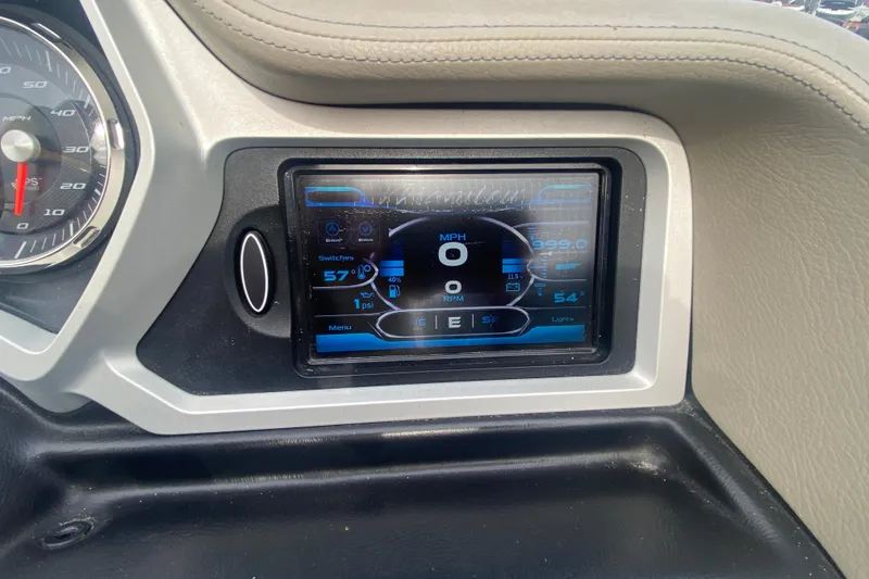 Slide: The Image of Dashboard of a 2016 Manitou 25 Legacy LT SHP with digital display and speedometer. - 22