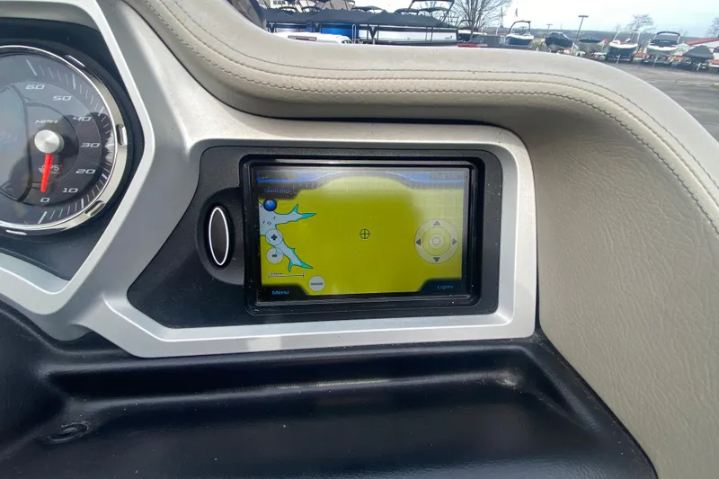 Slide: The Image of Dashboard of a 2016 Manitou 25 Legacy LT SHP with GPS display and speedometer. - 23