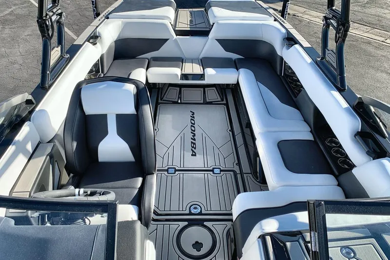 Slide: The Image of 2026 Moomba Mojo boat interior with sleek seating and modern design. - 12