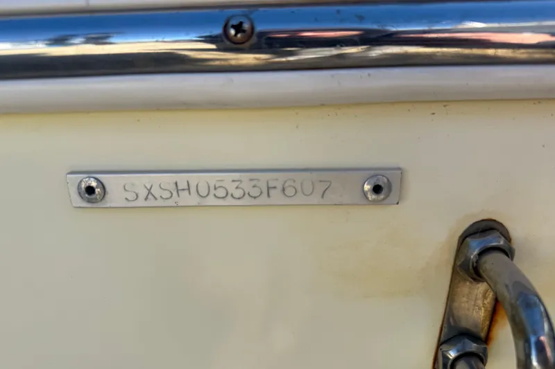 Slide: The Image of 2007 Sea Hunt Triton 220 boat identification plate with serial number SXSHU533F607. - 7