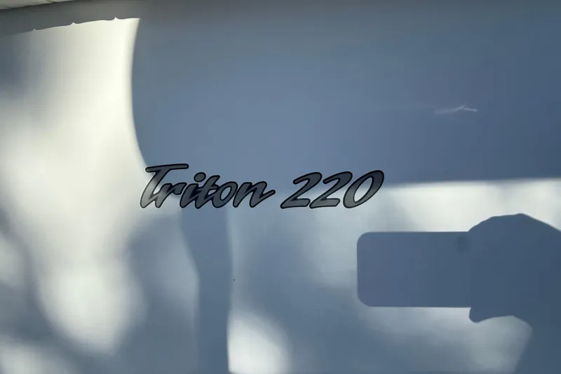 Slide: The Image of Sea Hunt Triton 220 boat logo with shadow, 2007 model. - 8