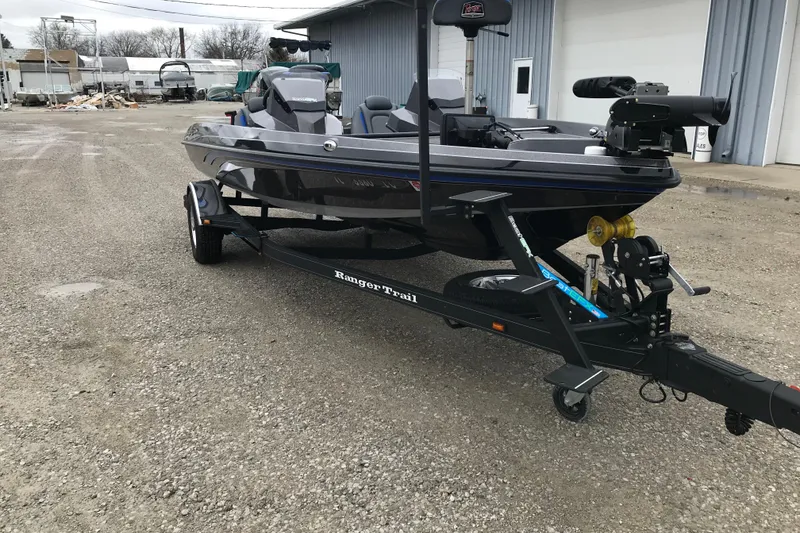 Slide: The Image of 2022 Ranger Z185 boat on trailer in outdoor setting. - 15