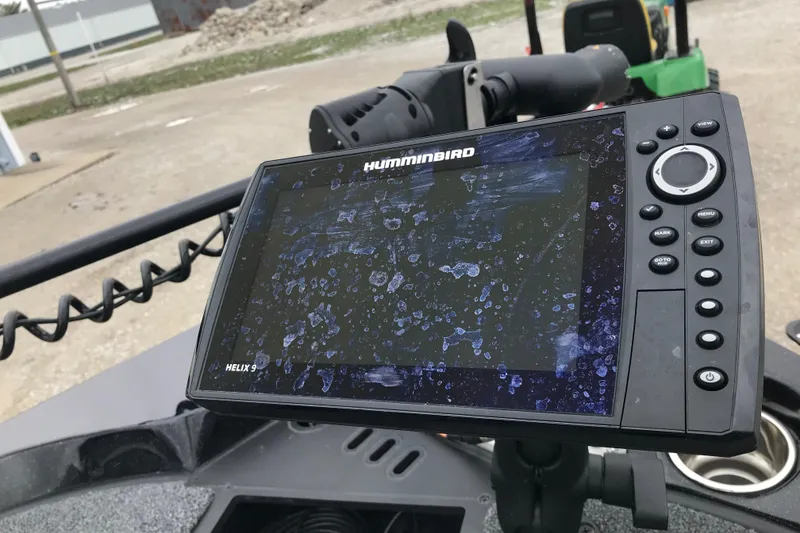 Slide: The Image of Humminbird Helix 9 fish finder on 2022 Ranger Z185 boat, outdoor setting. - 19