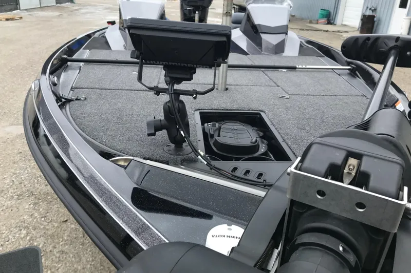 Slide: The Image of 2022 Ranger Z185 boat deck with mounted equipment and storage compartments. - 21