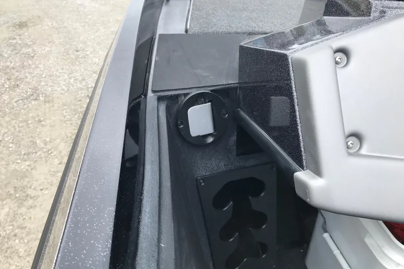 Slide: The Image of 2022 Ranger Z185 boat interior detail showing storage compartment and equipment. - 33