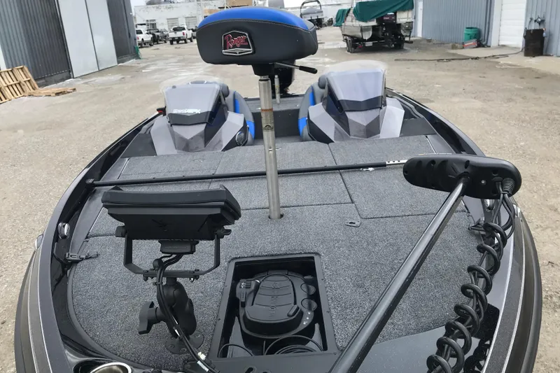 Slide: The Image of 2022 Ranger Z185 boat deck with fishing equipment and seating. - 37