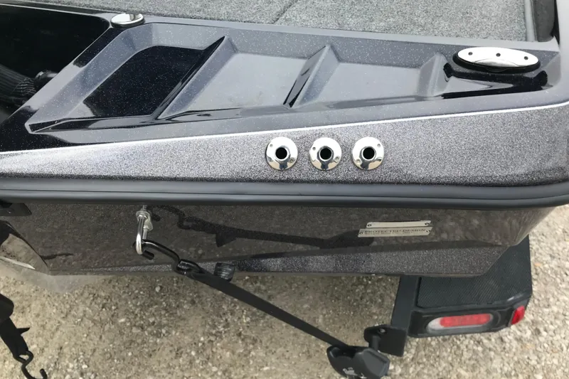 Slide: The Image of 2022 Ranger Z185 boat rear view with metallic finish and trailer attachment. - 39