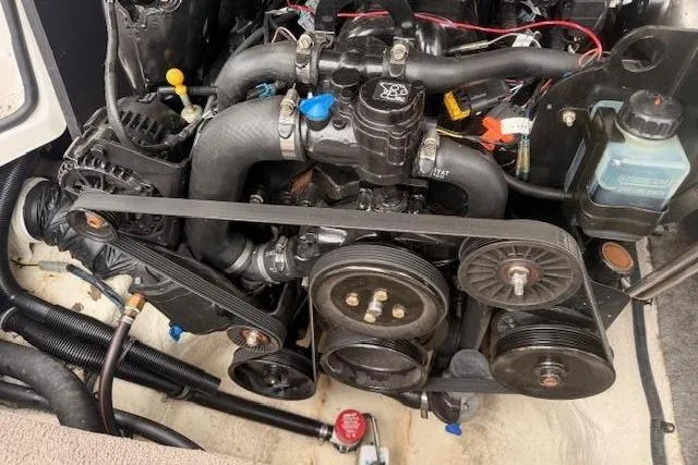 Slide: The Image of Engine of a 2012 Regal 24 FasDeck with belt drive. - 25