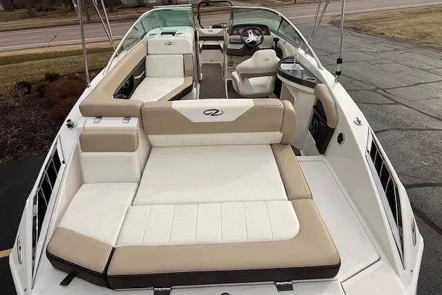 Slide: The Image of 2012 Regal 24 FasDeck boat interior with spacious seating and modern design. - 4