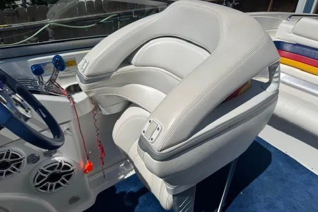 Slide: The Image of 2007 Formula 353 FASTech boat interior with white leather seating and blue accents. - 22