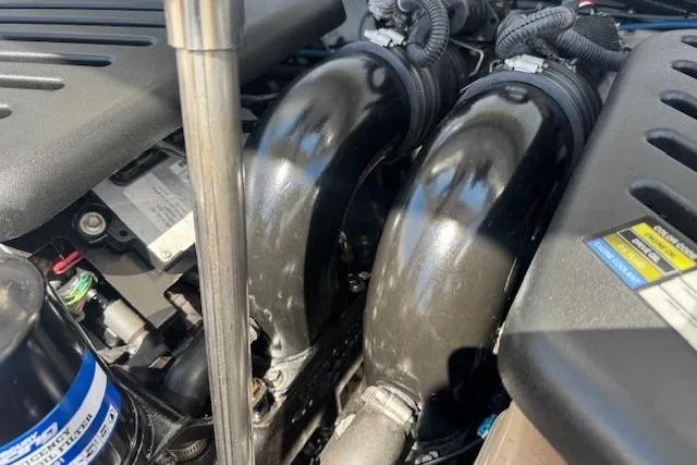 Slide: The Image of Engine components of a 2007 Formula 353 FASTech boat, showcasing intricate mechanical details. - 38