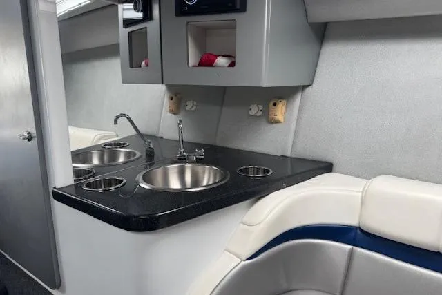 Slide: The Image of 2007 Formula 353 FASTech boat interior with kitchenette and seating area. - 41