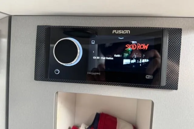 Slide: The Image of Fusion stereo system displaying Skid Row album cover in a 2007 Formula 353 FASTech boat. - 43