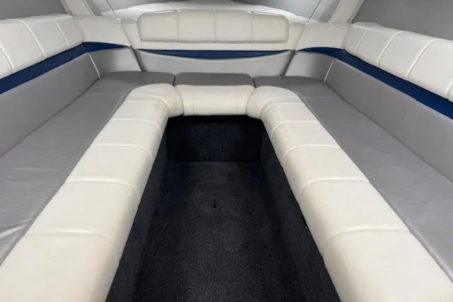 Slide: The Image of 2007 Formula 353 FASTech boat interior with white and gray seating. - 45