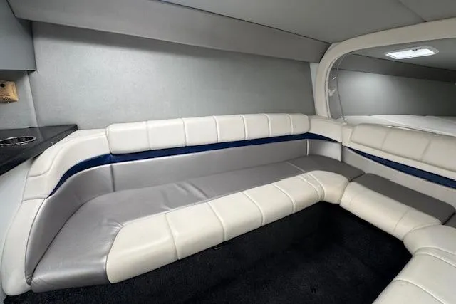 Slide: The Image of 2007 Formula 353 FASTech boat interior with white and gray seating, modern design. - 50