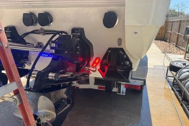 Slide: The Image of Rear view of a 2007 Formula 353 FASTech boat with Mercury outdrives. - 55