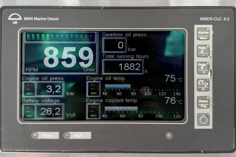 Slide: The Image of Display panel of a 2005 Sea Ray 550 Sedan Bridge showing engine metrics. - 21