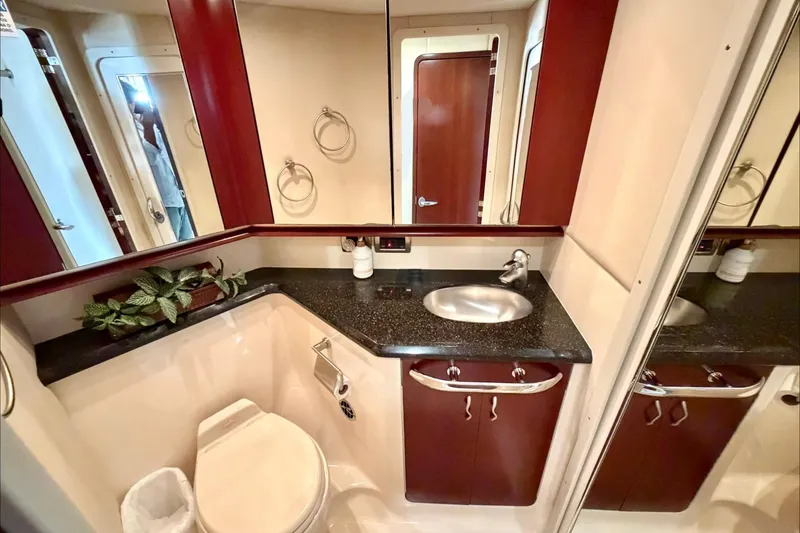 Slide: The Image of Luxurious bathroom in 2005 Sea Ray 550 Sedan Bridge yacht with elegant fixtures. - 32